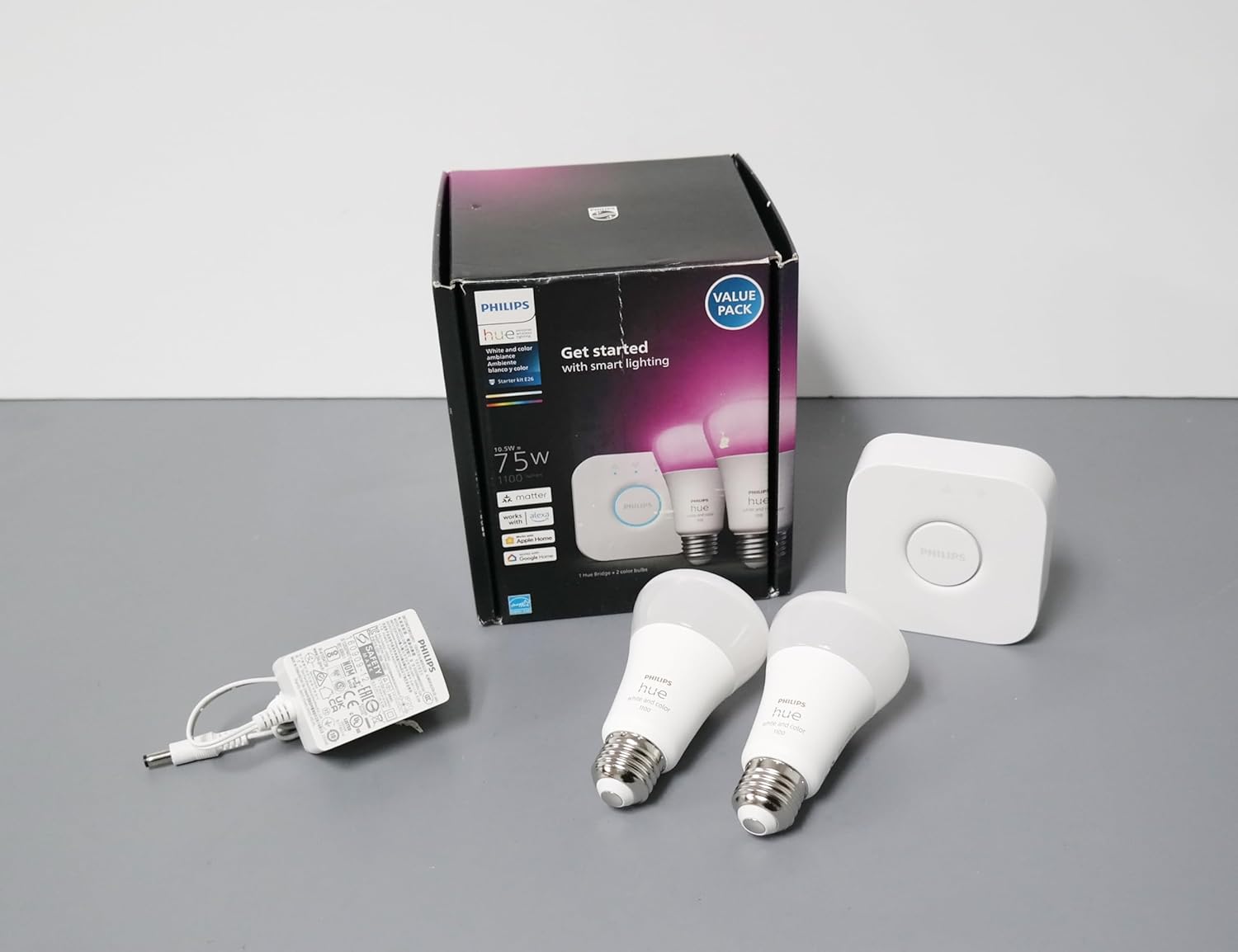 Philips Hue Smart Light Starter Kit - Includes (1) Bridge and (2) 60W A19 LED Bulb, White and Color Ambiance Color-Changing Light, 800LM, E26 - Control with App or Voice Assistant